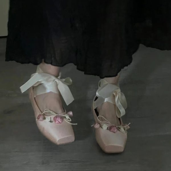 Woman Wearing Ballet Slippers With Cross Lacing - Image 4
