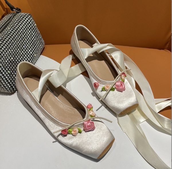 Woman Wearing Ballet Slippers With Cross Lacing - Image 3